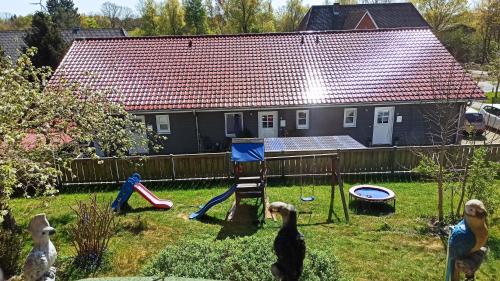 Dārzs, Ferienwohnungen im Reetdachhaus in Rantrum