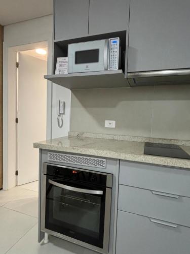 Loft with balcony and garage minutes away from corporate axis