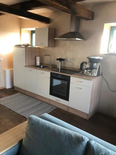 廚房, Ferienhaus vom Hauendamm in 布魯赫豪森菲爾森