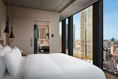 NH Collection Frankfurt Spin Tower Room Type - Family Adjoining Room (3 Adults + 1 Child)