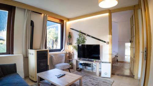 صالة مشتركة/ منطقة التلفزيون, Chalet la Pagode, vue Mont-Blanc et jardin privé (Chalet la Pagode, vue Mont-Blanc et jardin prive) in ليه جاودينايس