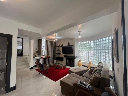 Közös társalgó / TV, Casa Praia Brava Florianópolis. (Casa Praia Brava Florianopolis.) in Praia Brava