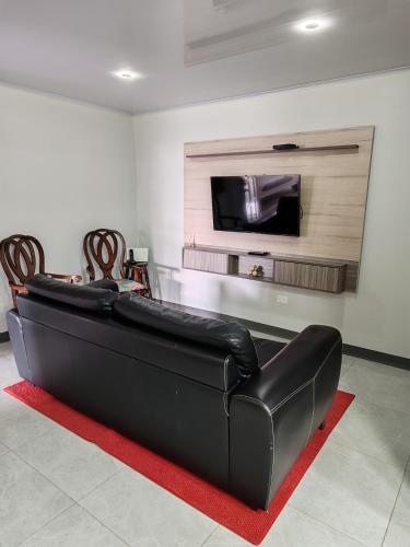 Shared lounge/TV area, completo in San Juan
