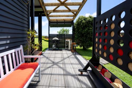 Exterior view, Onaero s Quaint Little Cottages in Urenui