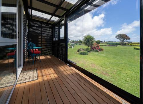 Exterior view, Onaero s Quaint Little Cottages in Urenui