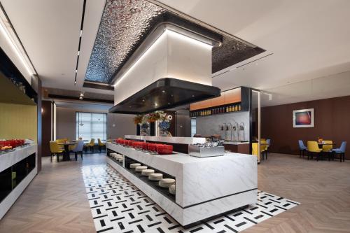 Restaurant, 长沙五一广场希尔顿欢朋酒店Hampton by Hilton Changsha Wuyi Square in Changsha
