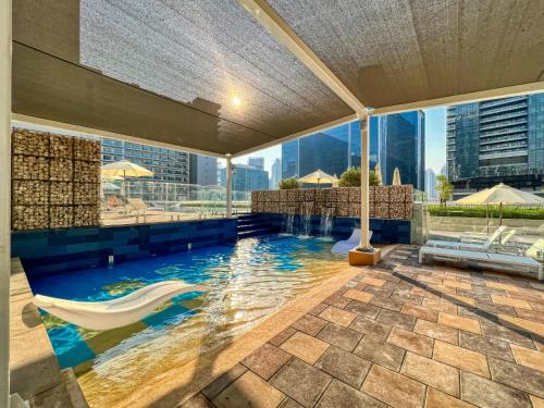 Luxury 2BD Apt with Pool GYM & Burj Khalifa Views Luxury 2BD Apt with Pool GYM & Burj Khalifa Views