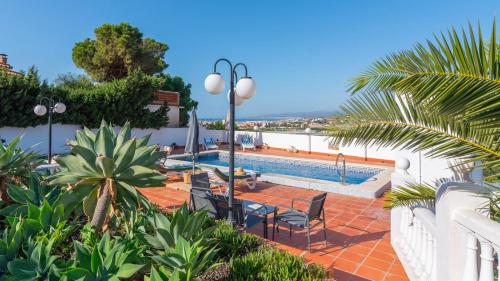 Three-Bedroom House room in Villa Chalet con Piscina Torrox by Ruralidays
