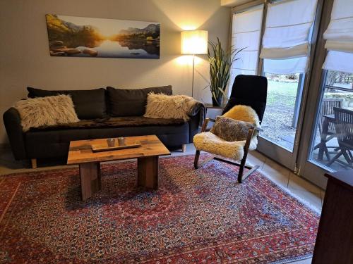 Landhauswohnung mit Terrasse im alten Ortskern, EG in Rosbach V.D.H.