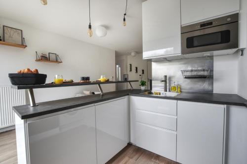 廚房, Le Cosy De l'Ourcq T2 40m2 20 min de Paris in 維勒班