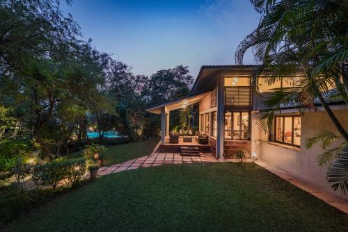 SaffronStays Laguna - 4BR vintage-chic villa with unique pool, gazebo & terrace sit-outs near Mandwa Jetty, Alibaug, Alibaug