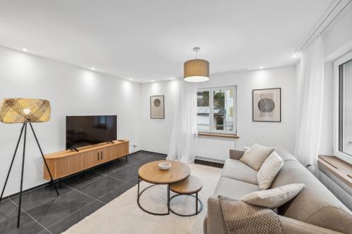 ห้องส่วนกลางสำหรับนั่งเล่น/ดูทีวี, The R Apartment Rheinfall - central free parking in ชาฟฟ์เฮาเซน