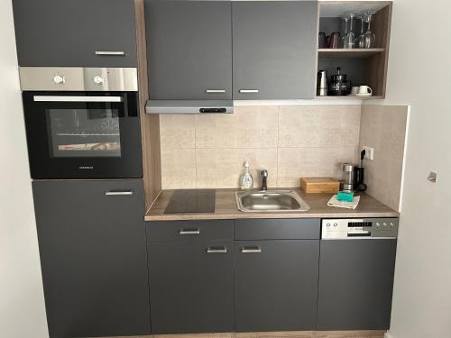 廚房, Ferienwohnung mit Infrarotsauna in 科埃斯費爾德