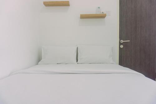 Minimalist and Comfort 2BR Serpong Garden Apartment By Travelio, Tangerang