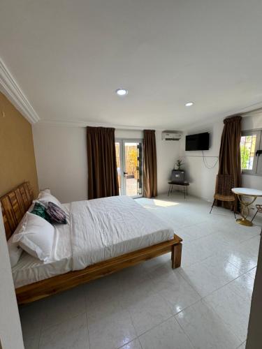 Chambre La Villa Kalanga in อาบิดจัน