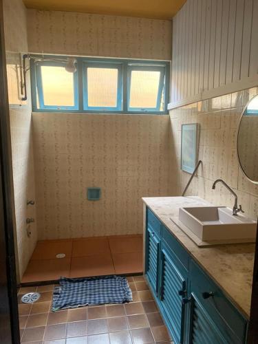 ห้องน้ำ, Casa aconchegante perto da praia in ไกวยูบา