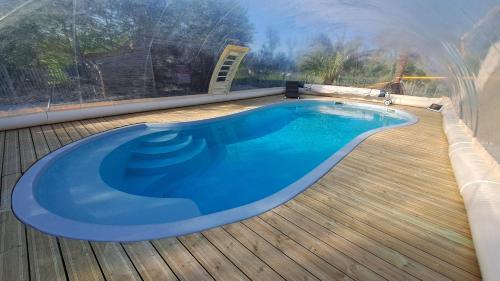 Peldbaseins, Gites O Ptit Bonheur - Vendee - 2 Maisons de 85 m2 chacune avec piscine exterieure chauffee & couver in Saint-Christophe-du-Ligneron