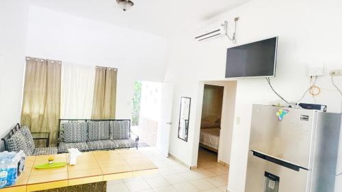 صالة مشتركة/ منطقة التلفزيون, Golden Sunset House in Los Cobanos