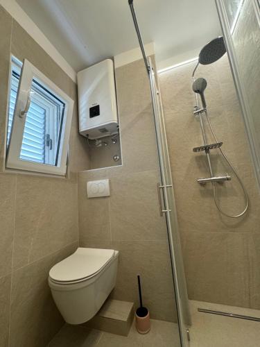 Two-Bedroom Apartment with Sea View room in Apartments Amelie Ražanj