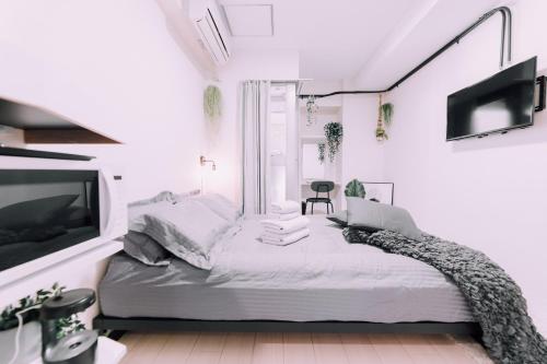 Minimalist Loft Namba Compact Studio with a 24-hour Gym MA605, Osaka