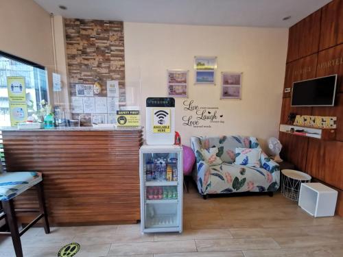 Shared lounge/TV area, Acrige Apartelle Studio Rooms at heart of Bogo City in Bogo City