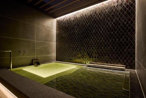 Open air bath, HOTEL NUQU in Yatomi
