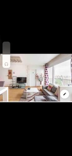 Спільний лаунж/ТБ зона, Chambre proche aéroport Orly à 3 min du T12 (Chambre proche aeroport Orly a 3 min du T12) in Віри-Шатіллон