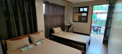 Guestroom, Elyn's Guesthouse - Three Transient Units in Davao City - Total 5 rooms, 3 t & b for exclusive use in Catalunan Grande