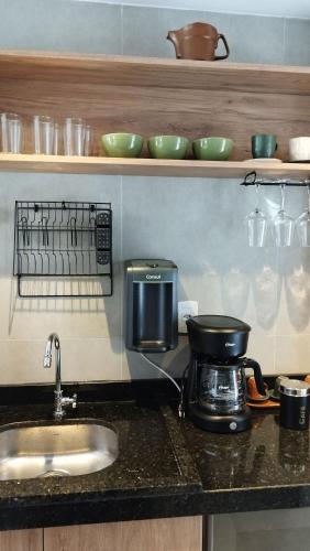 Estudio moderno na melhor localização de Poços