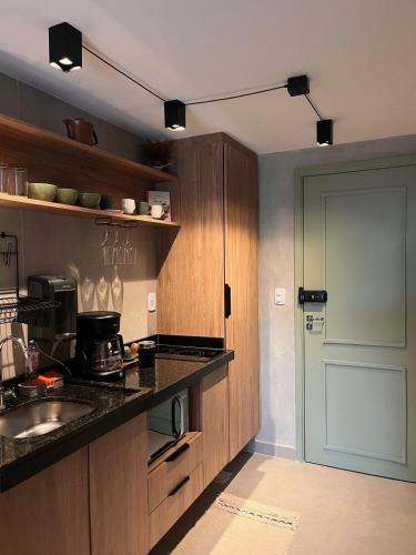 Estudio moderno na melhor localização de Poços