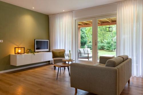 wspólne pomieszczenie/salon TV, Het Boshuys in Koekange