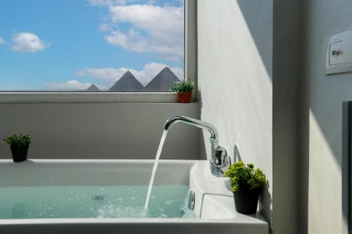Dar Pyramids View Inn RoofTop - Tap to explore photos