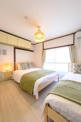 Cozy 2-Floor Retreat near Ikebukuro - Easy Access to Central Tokyo - アキサポステイ本蓮沼