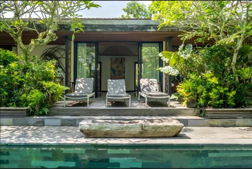 Garden View Suite with Complimentary Access to Titi Batu Sports Club room in Surya Kembar Luxury Villas
