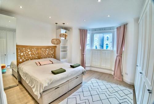 Bright Cozy Garden Retreat w Fast Wifi & 5min to Tube Subway Metro & Close to Park & Street Parking P4P, Londra (foto 3)