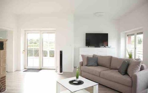 Wunderschöne und moderne Ferienwohnung mit Garten, Emden