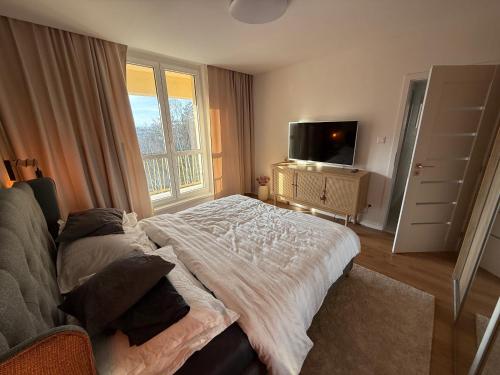 Mountain Heim Apartment near สนามบินโปปรัด-ตาตรี
