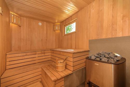 Szauna, Trommeļa brīvdienu mājiņas-kempings (Trommela brivdienu majinas-kempings) in Dundaga