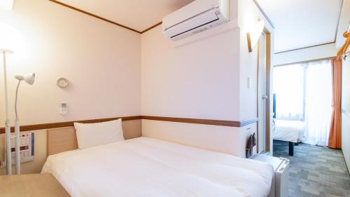 Toyoko Inn Hokkaido Sapporo-eki Nishi-guchi Hokudai Mae