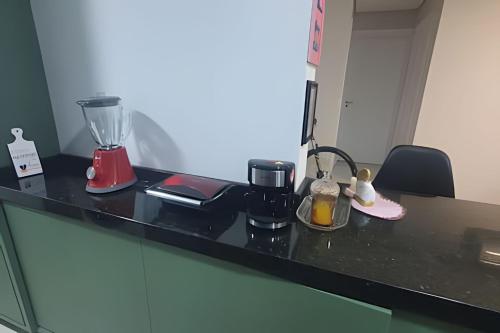 Aconchego Completo: Apartamento com Quintal e Cozinha Perfeita