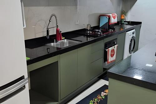 Aconchego Completo: Apartamento com Quintal e Cozinha Perfeita