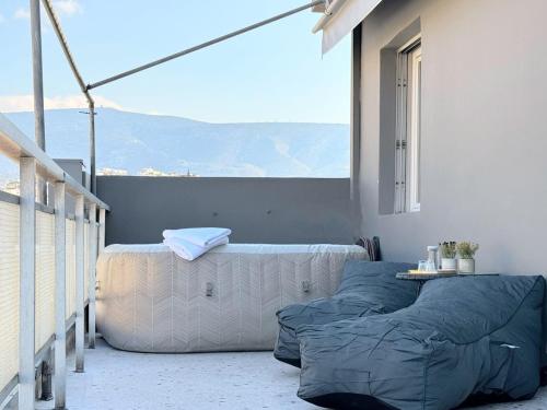 Lovely APT w/heated Jacuzzi &full Acropolis view - Tap to explore photos