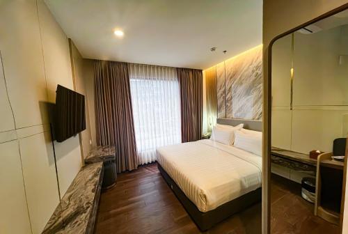 Bathroom, d'primahotel PIK Jakarta in Pluit