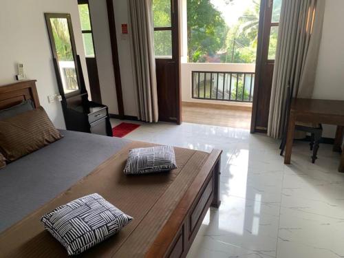 Deluxe Double Room with Balcony and Sea View room in Villa Rukaththana UNAKURUWA