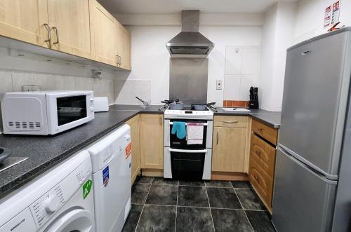-F1-GH- Enjoy a wonderful stay in our Cosy Luxurious, Spacious ground floor apartment, Free Parking, Free WiFi, Leeds (Foto 4)