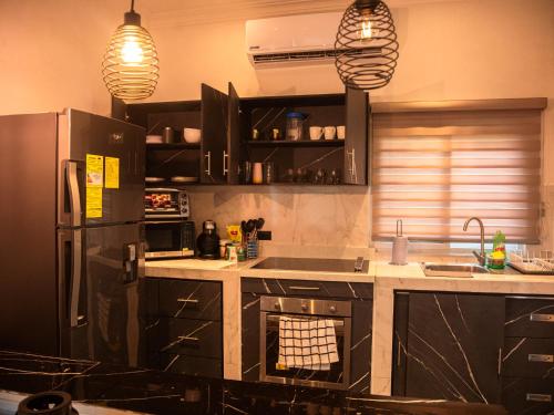 Moderna Casa con piscina , jacuzzi y generador electrico in ปวยร์โต บาริโอส