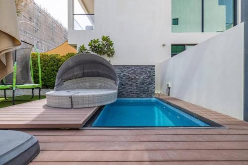 Coastal Themed 4BR Townhouse with Pool in JVC, Dubai