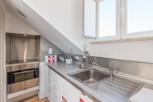 Traveling To Lisbon Alfama Apartments - main image