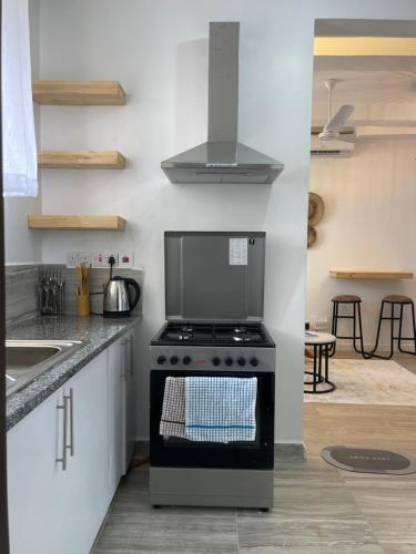 virtuve, Serene Furnished Apartments in Kijangwani