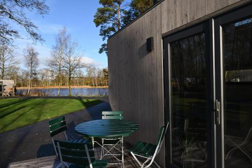 Balcony/terrace, Tiny House Pioneer 5 - Green Tiny Spot Friesland in Schortens